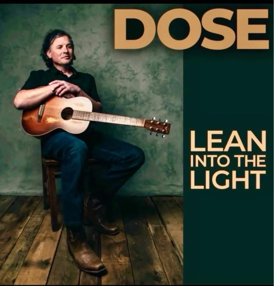 Lean Into the Light artwork featuring Jamie Dose with an acoustic guitar